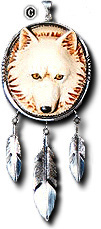 Carved fossil ivory wolf's head.