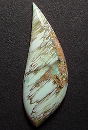 Splendid variscite with spiderwebbed streaks.