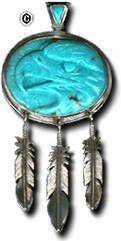 Carved turquoise eagle's head.